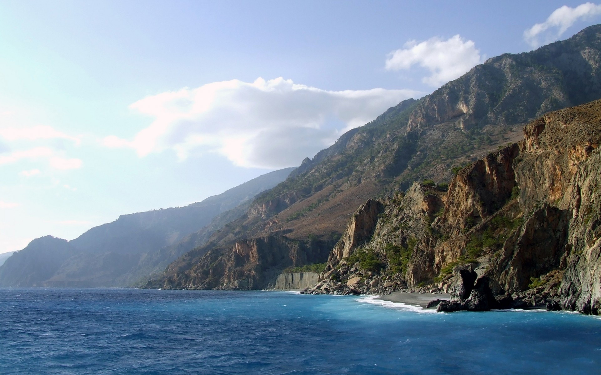 grèce eau voyage paysage mer ciel nature à l extérieur montagnes mer rock océan scénique lumière du jour plage baie