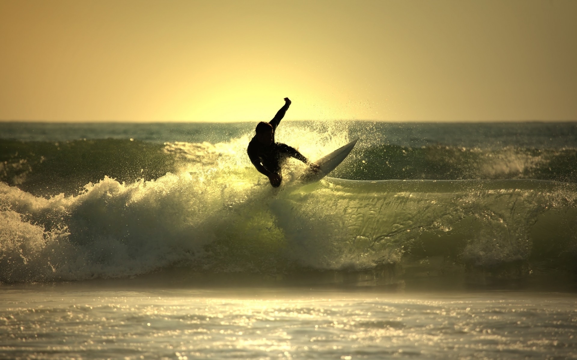 surfing water sunset beach surf ocean sea dawn sun silhouette action sky dusk evening seashore storm