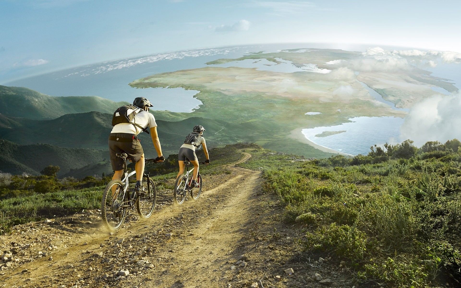 cycling travel sky mountain nature landscape outdoors adventure recreation summer water leisure grass freedom hike road