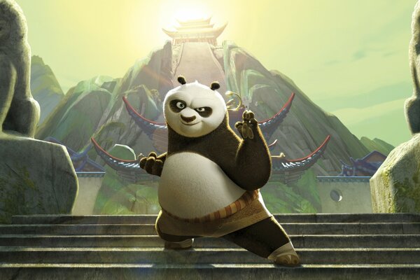 Funny panda on the background of stairs and statues