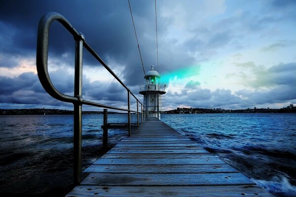 A lonely lighthouse in the evening sea