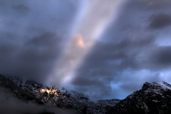 The rays of the setting sun in the sky