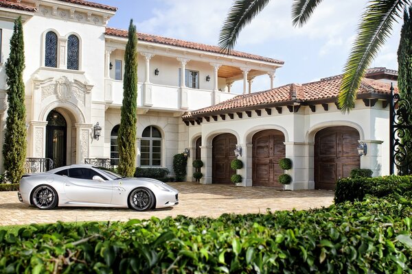 Cityscape, country house with ferrari