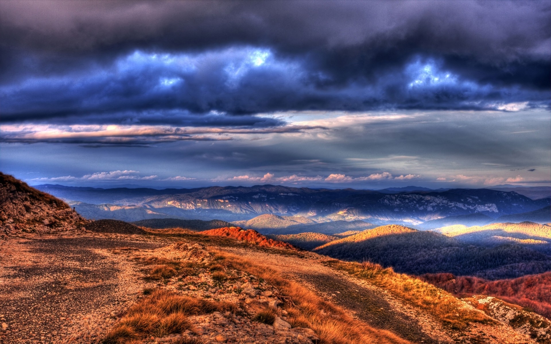 paysage coucher de soleil paysage ciel nature voyage désert montagnes à l extérieur aube scénique crépuscule soir nuage tempête dramatique soleil beau temps nuages