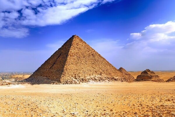 Egyptian pyramid and dark blue sky