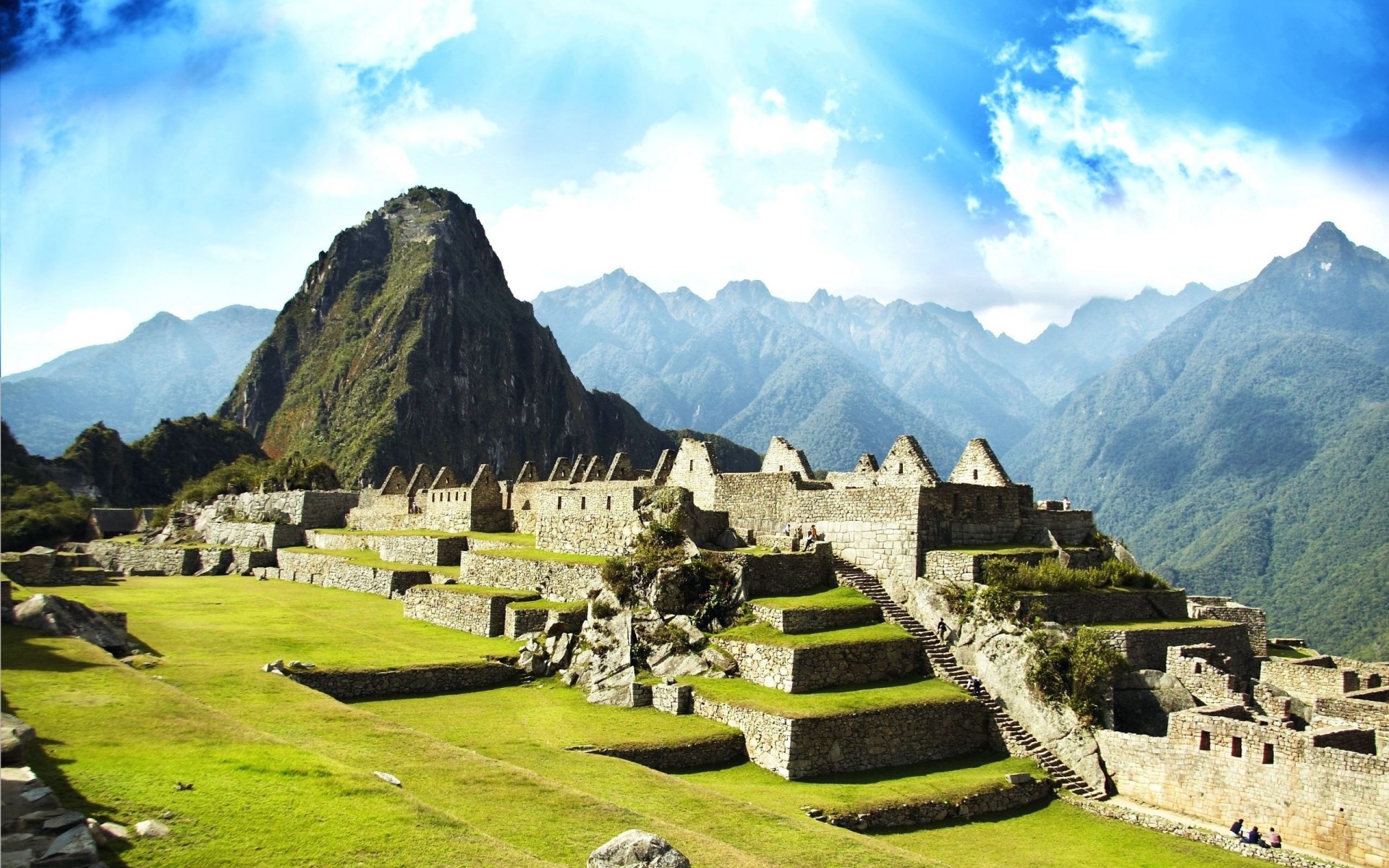 other city travel mountain valley architecture outdoors landscape tourism grass scenic nature sky house peru history ruins stones