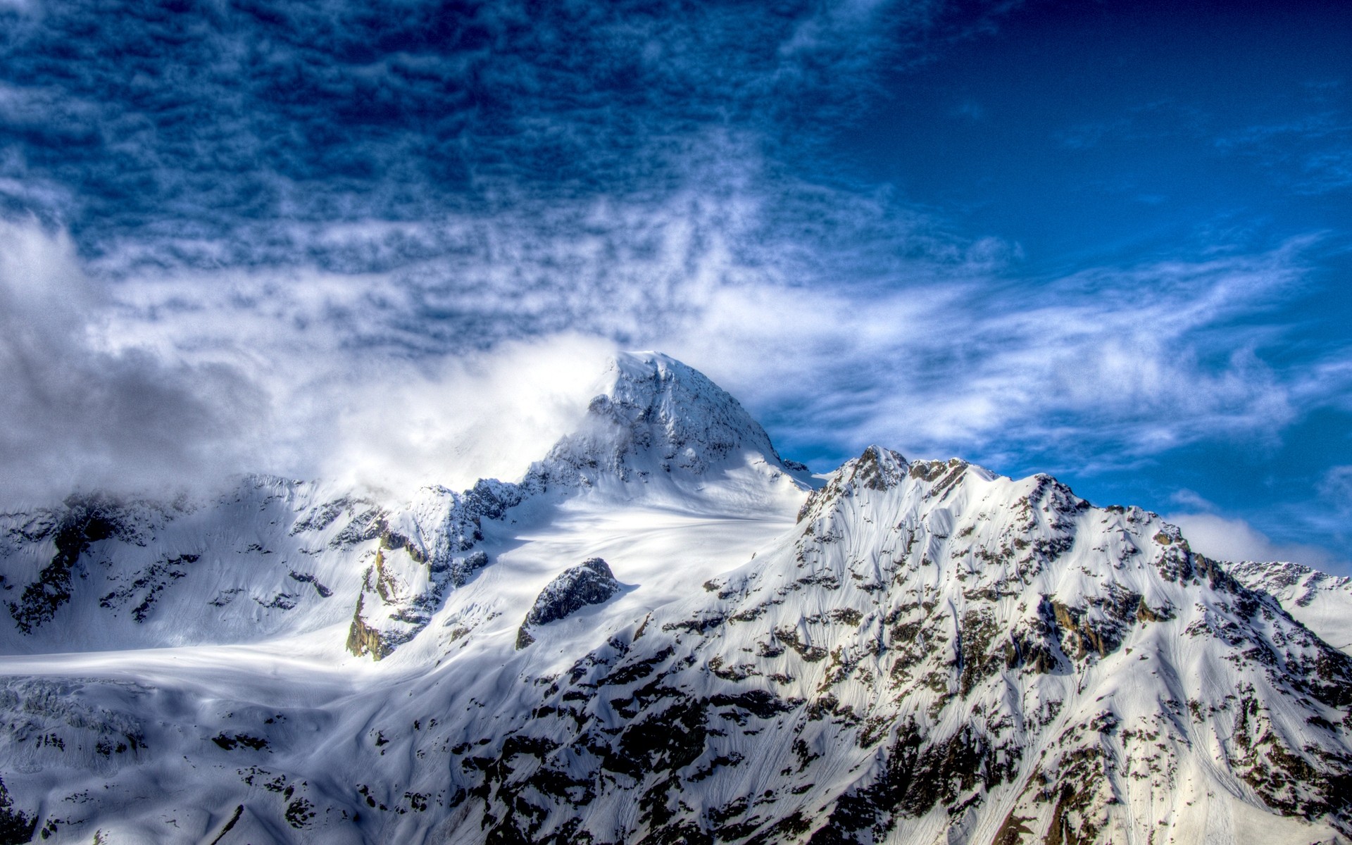 winter snow mountain ice scenic mountain peak landscape glacier high sky cold travel nature altitude pinnacle climb outdoors scenery