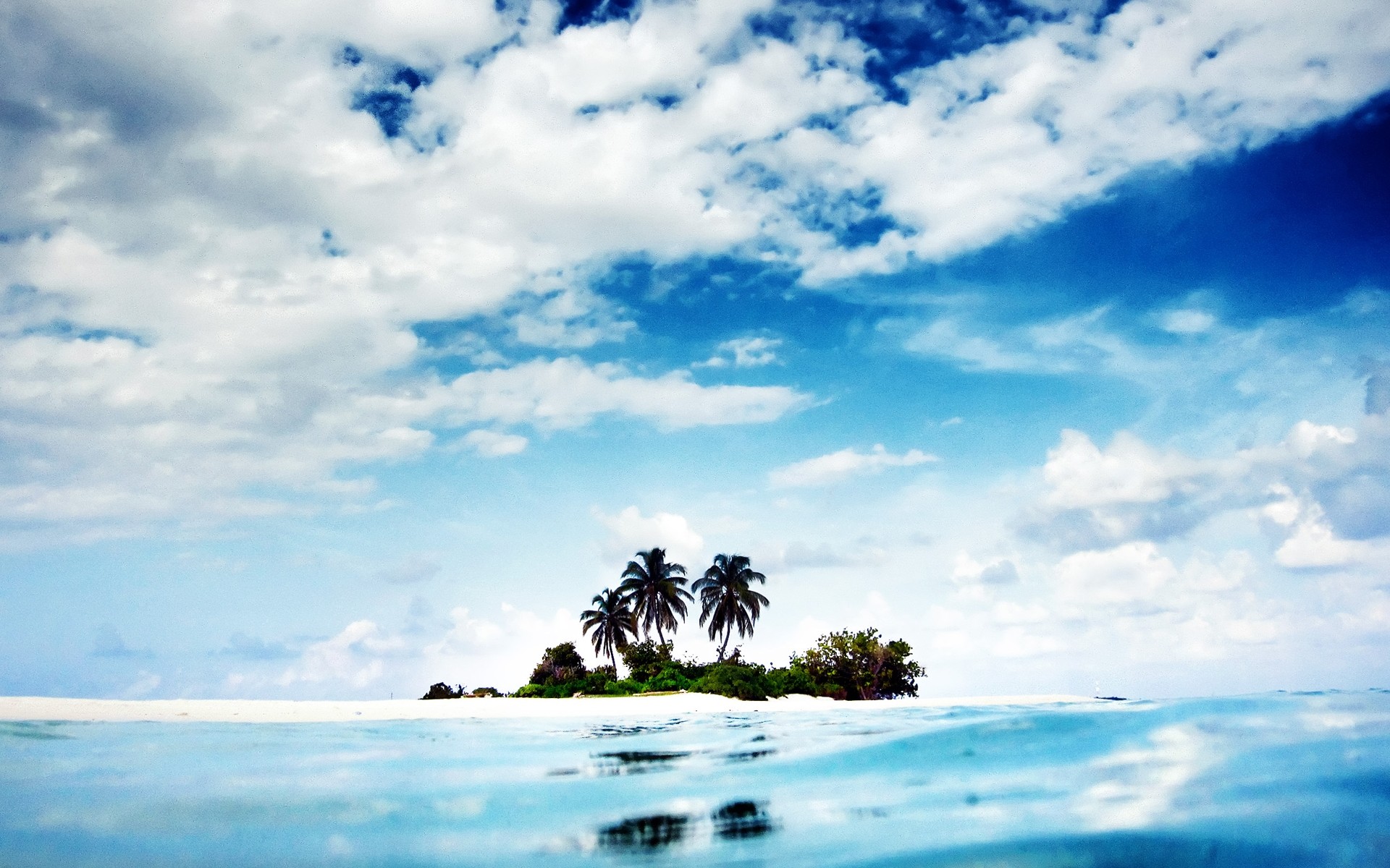 sommer wasser strand ozean himmel tropisch reisen meer natur meer im freien insel landschaft sonne sand gutes wetter landschaft wolke idylle blau foto foto