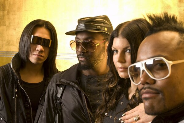 A musical group in sunglasses