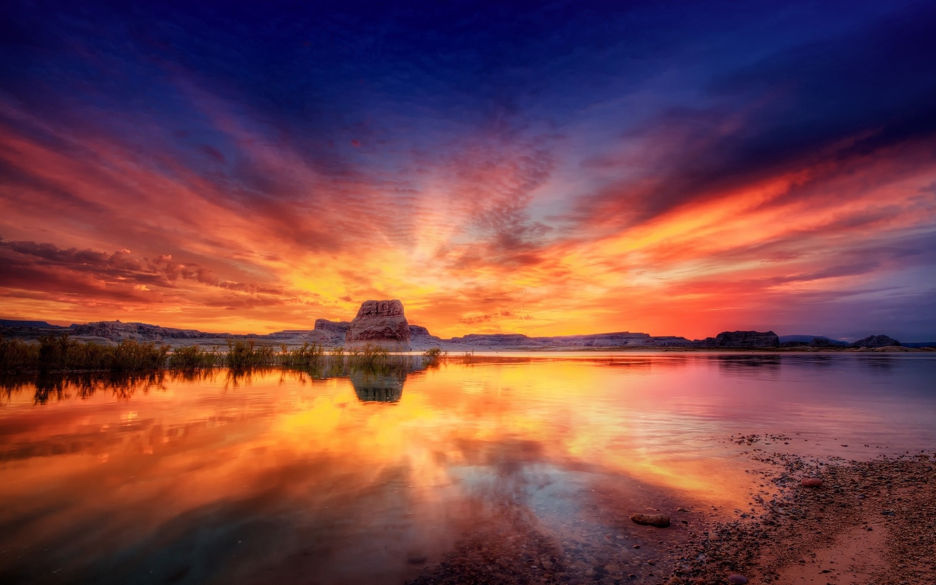 landscapes sunset water dawn dusk reflection evening sky landscape sun lake stones