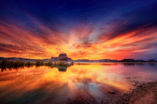 Lake on sunset background