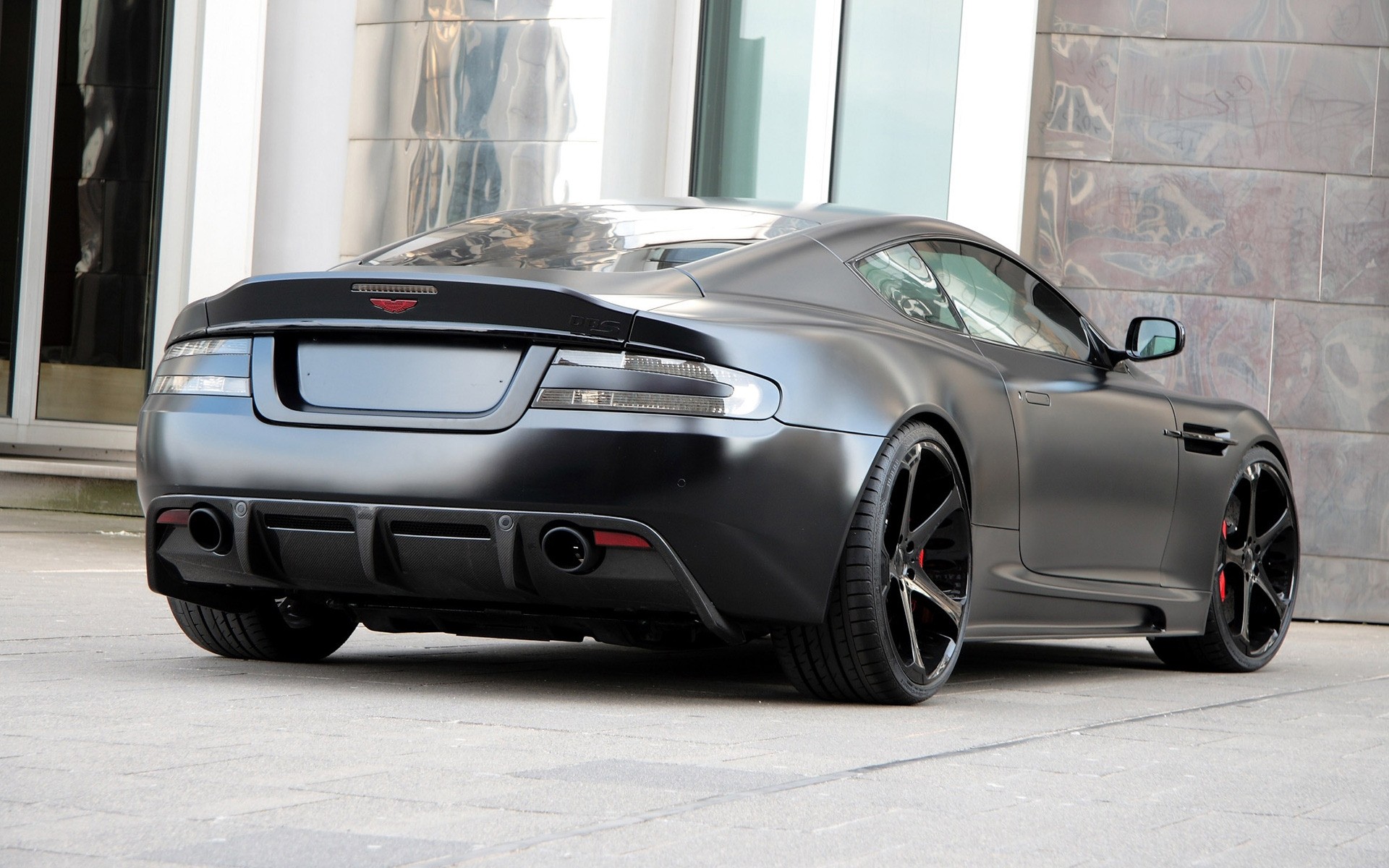 aston martin car vehicle wheel transportation system automotive fast asphalt pavement drive coupe sedan aston martin dbs