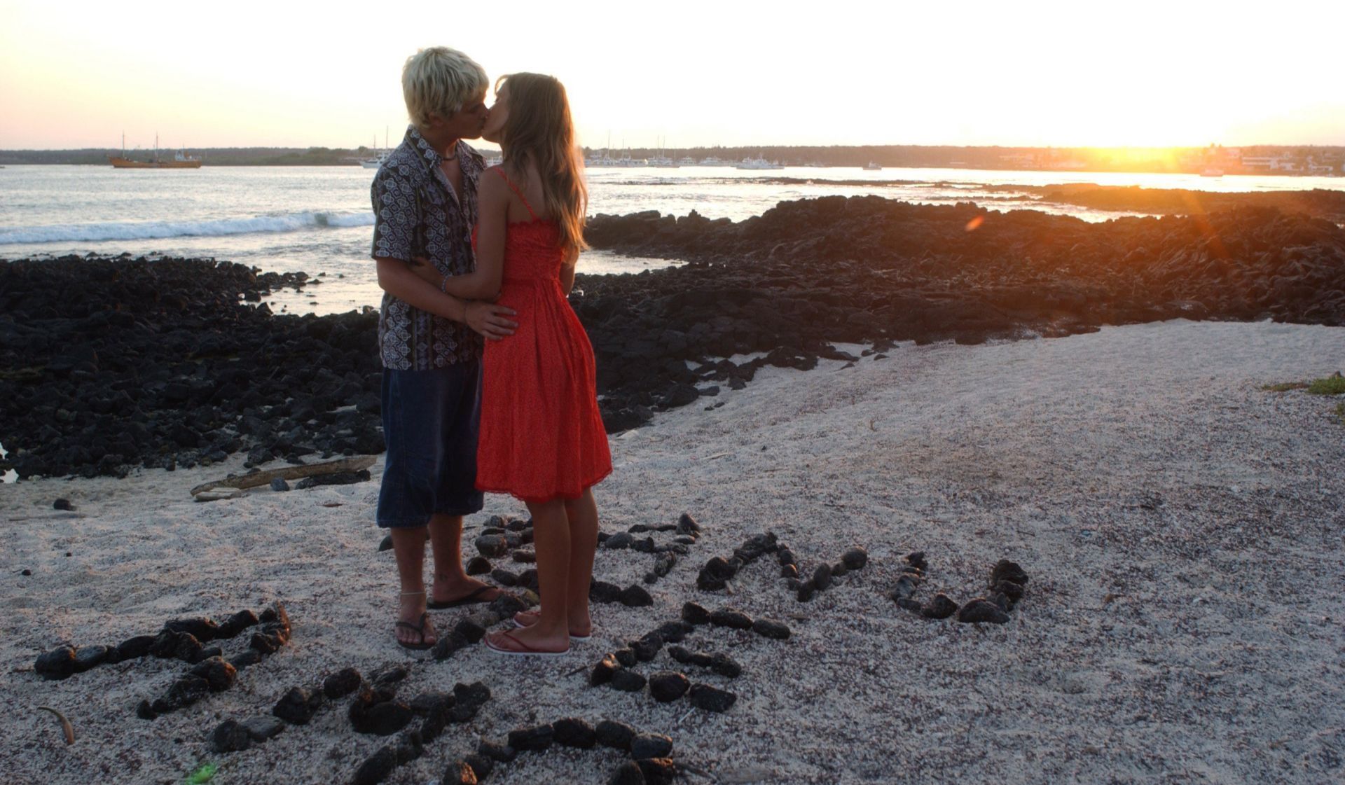 couples beach seashore sea sand water ocean two child outdoors sunset