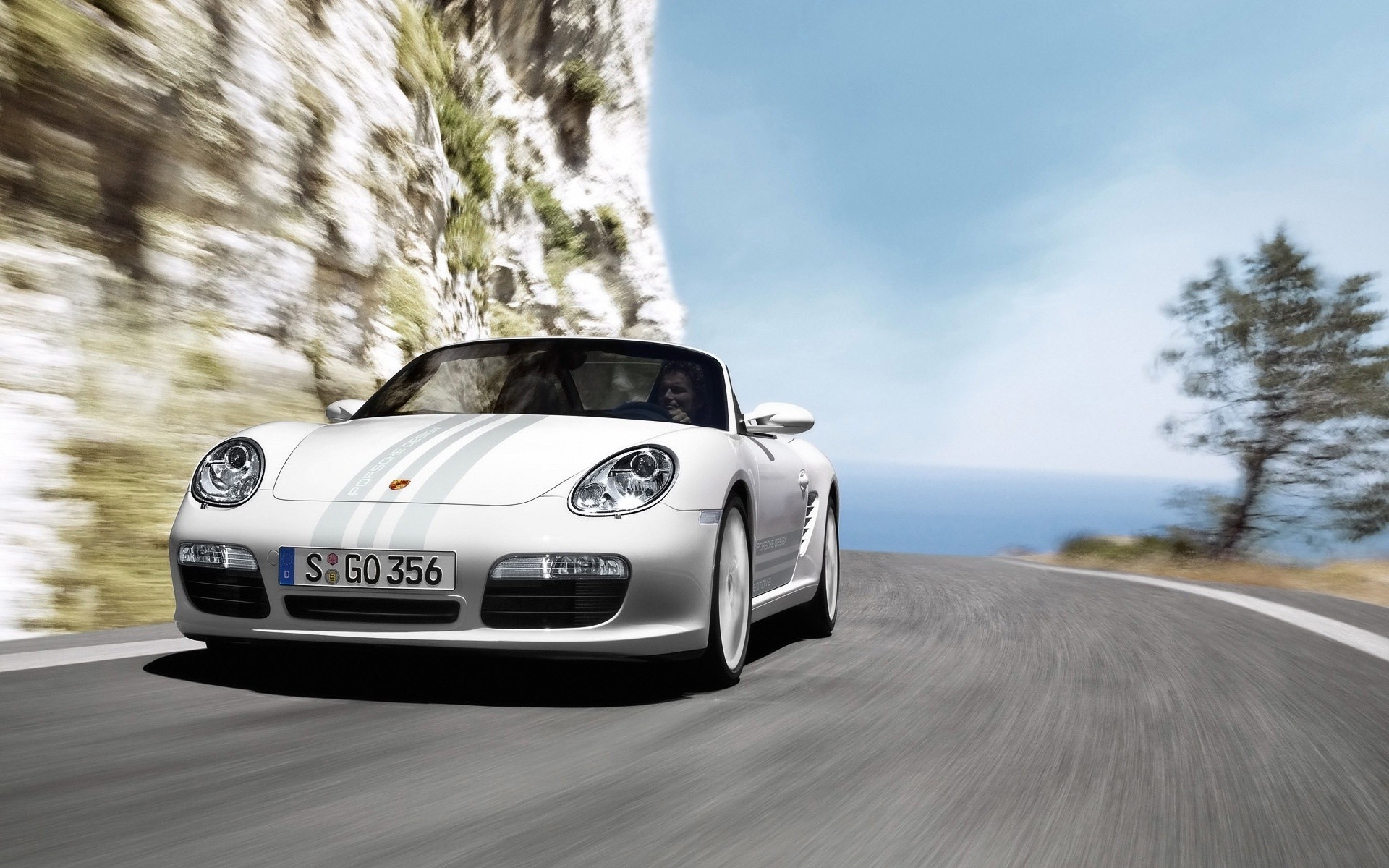 porsche car vehicle asphalt transportation system road hurry drive travel fast outdoors pavement action blur