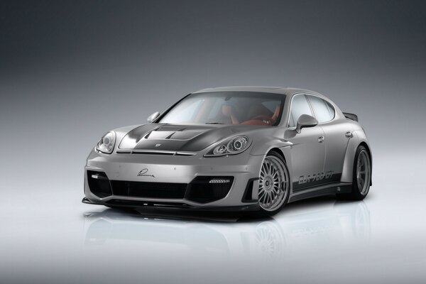 Porsche car on a gray background