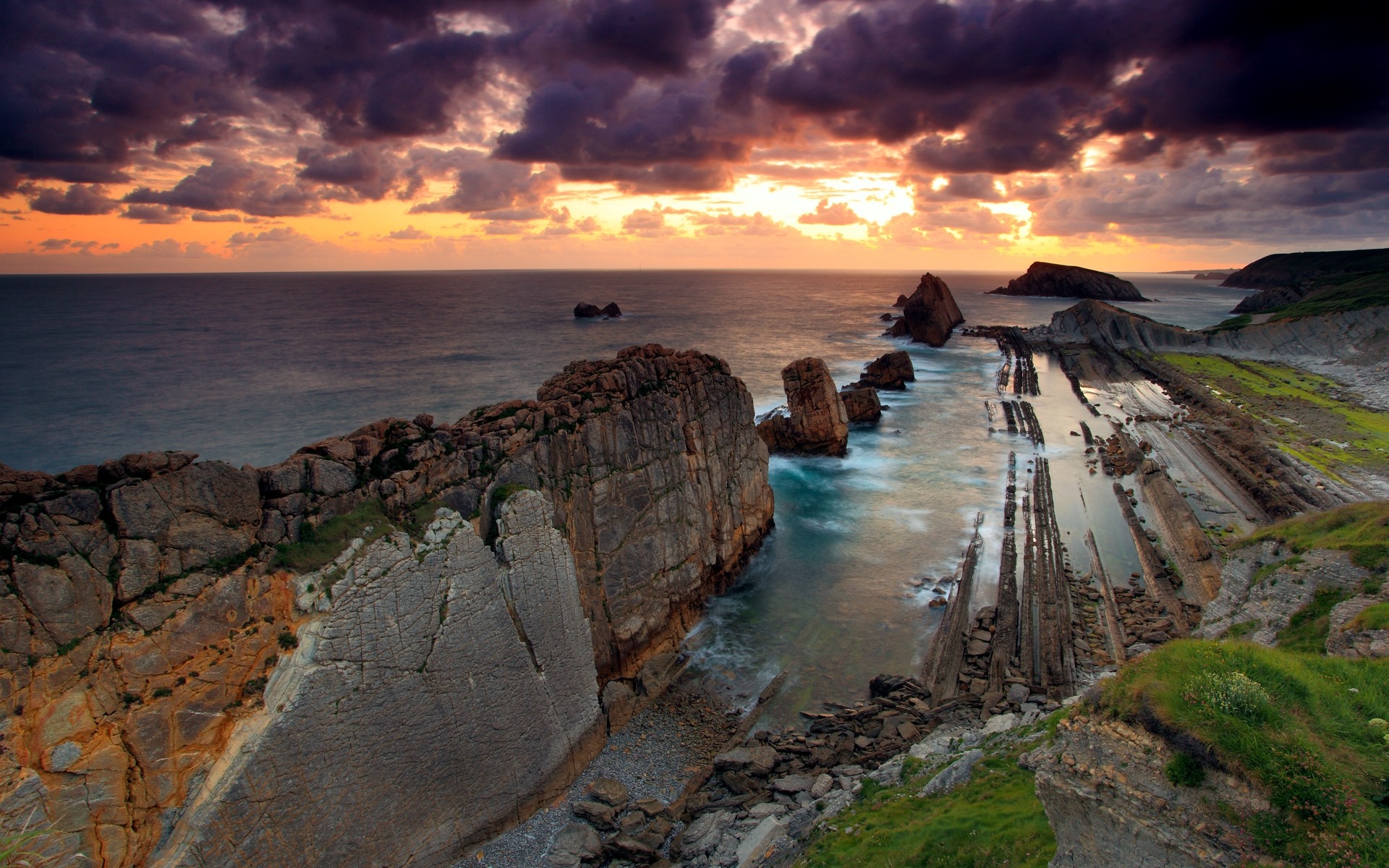 paisaje puesta de sol agua playa mar mar océano amanecer noche anochecer paisaje viajes cielo paisaje al aire libre sol nubes piedras naturaleza