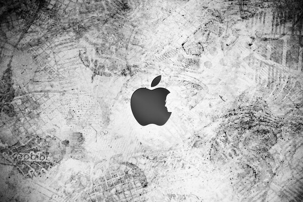 Fondo monocromo con textura y el icono de apple