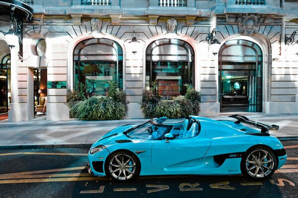 Blue car on a beautiful street