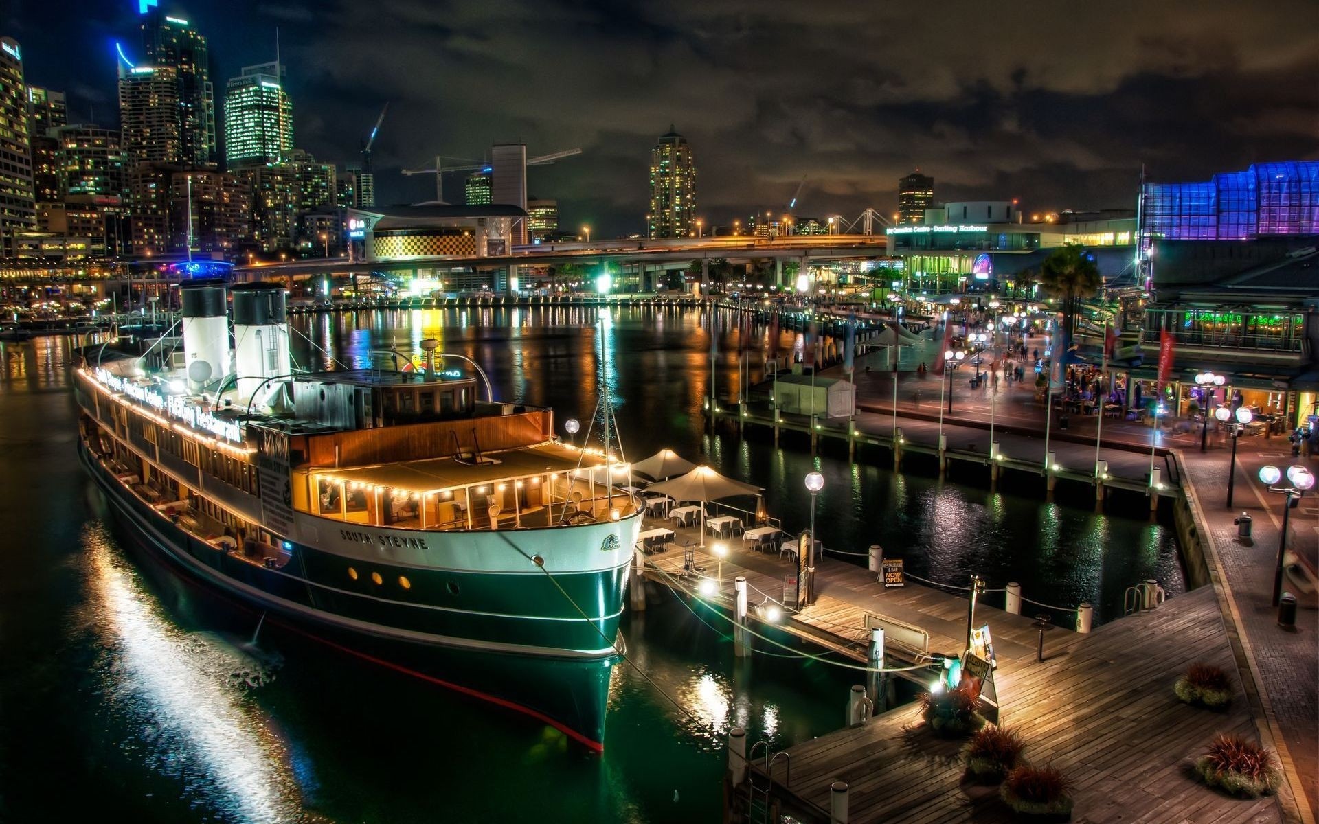 australien reisen stadt am abend wasser dämmerung transportsystem städtisch haus hafen promenade architektur hotel fluss bucht meer hintergrundbeleuchtung brücke geschäft pier boot drc licht nacht