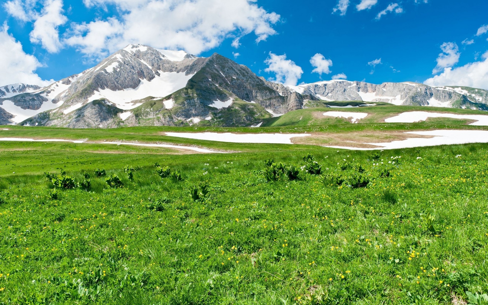 spring landscape mountain nature travel sky grass outdoors scenic summer hayfield hill valley sight mountain peak daylight scenery tree cloud winter snow mountains