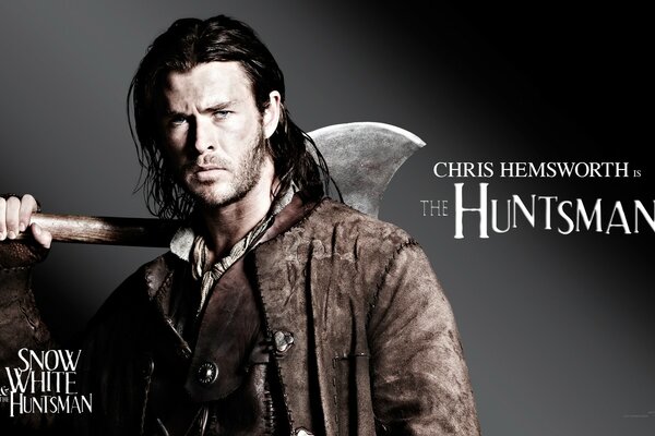 Chris Hemsworth with a gun