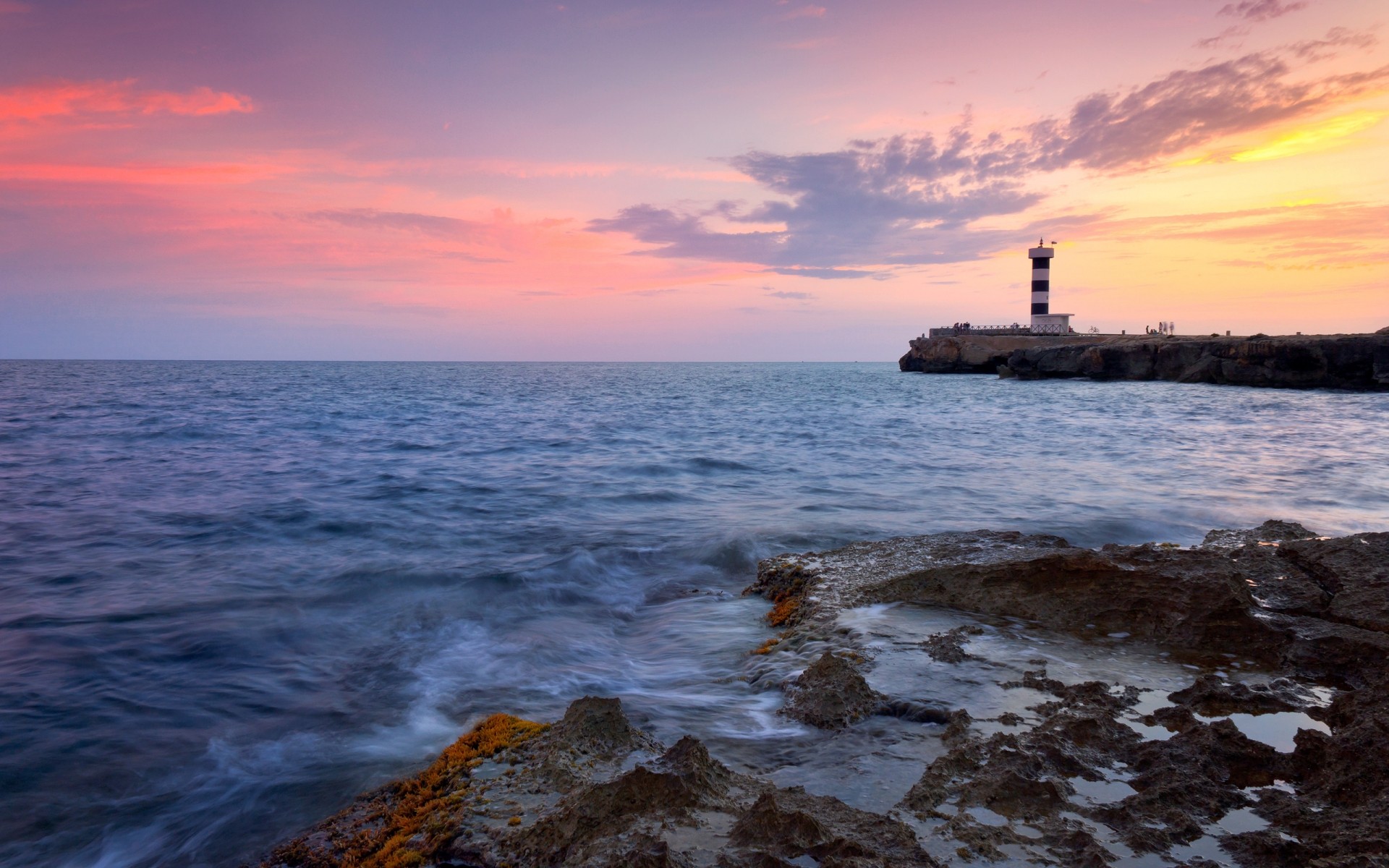 landscapes sunset water sea dusk ocean dawn beach seashore sky evening seascape landscape sun travel lighthouse rocks