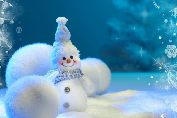 Snowman and big snow balls on a blue background