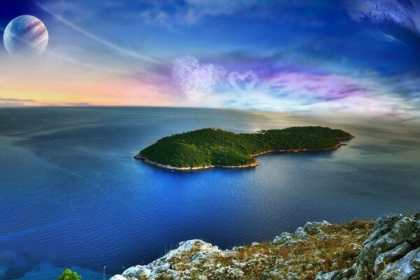 Una isla entre el mar azul y el cielo azul