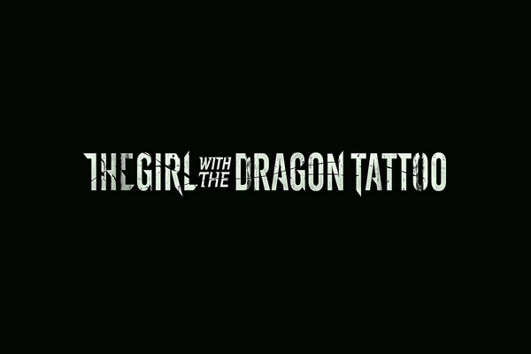 White inscription in English on a black background about a girl with a dragon tattoo