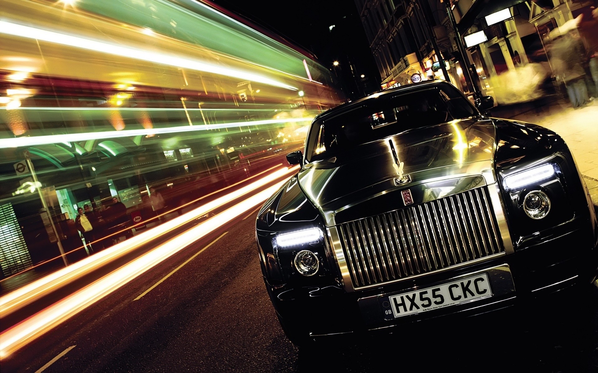 rolls royce car transportation system fast blur traffic speed road street downtown