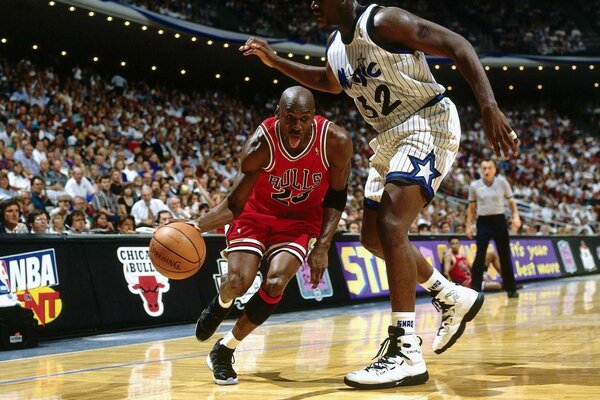 Checkago Bulls game. Basketball player Michael Jordan makes a pass