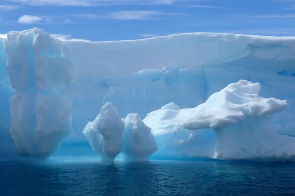 The image of an iceberg on the background of water