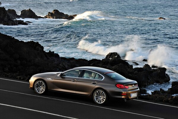 Car on the measure, dmw by the ocean