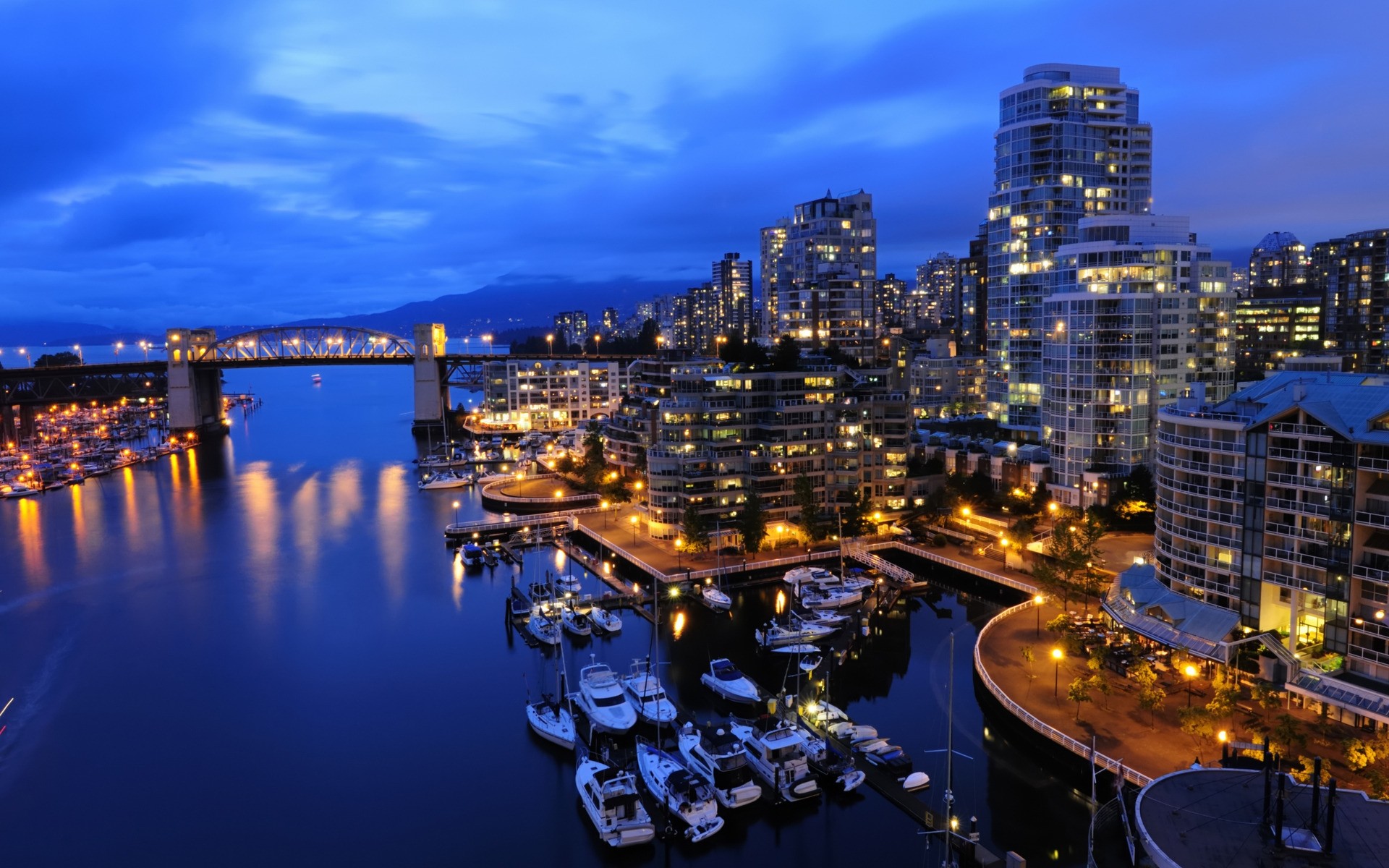 other city city architecture dusk travel water evening cityscape illuminated skyline building sky river downtown bridge skyscraper business sunset reflection waterfront canada north lights night port boat