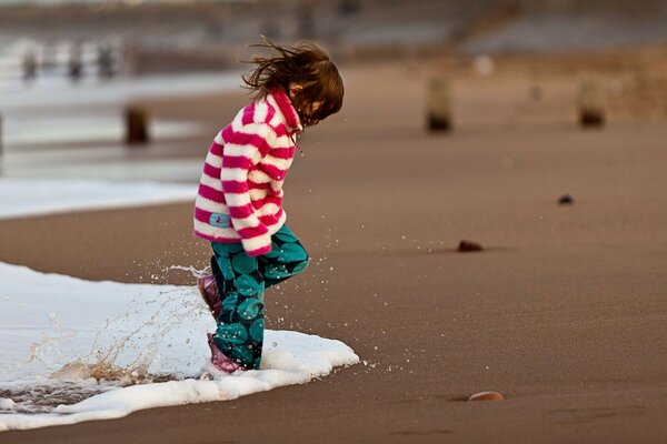 A little girl on the seashore