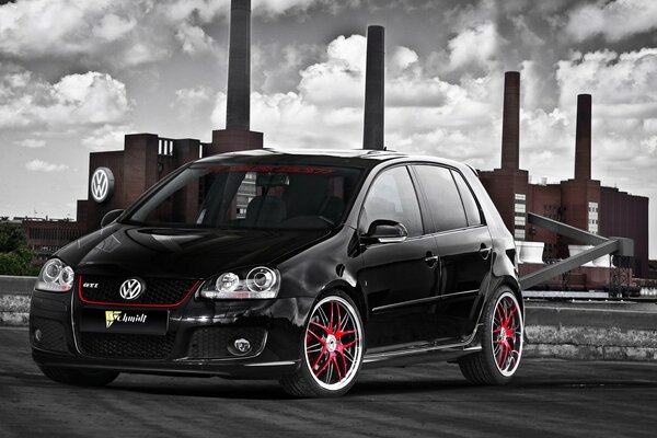 Fast volkswagen with red wheels