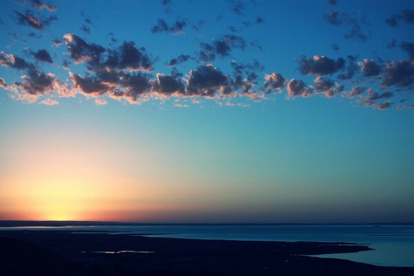 Sunrise on the sea horizon