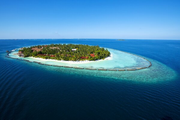 A lonely island with a beach in the ocean