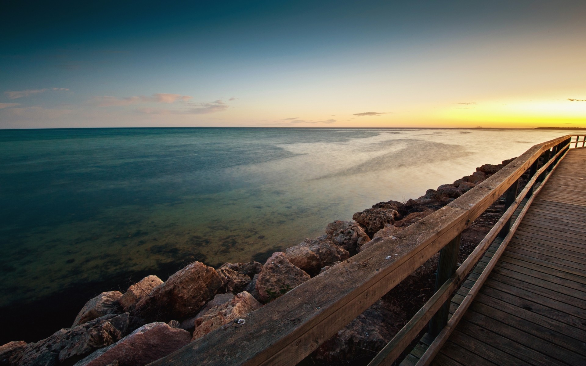 paysage coucher de soleil plage eau mer océan mer paysage ciel voyage crépuscule aube soir paysage soleil lumière pierres pierres