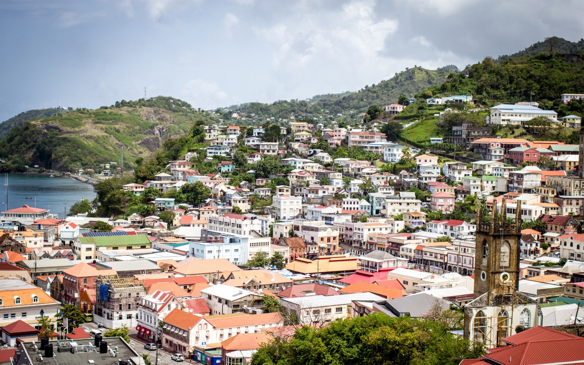 other city town city house travel architecture cityscape seashore sight roof sea water outdoors panorama aerial urban harbor hill church tourism village tropical islands