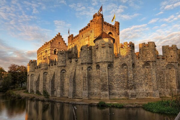 Medieval castle with a moat filled with water