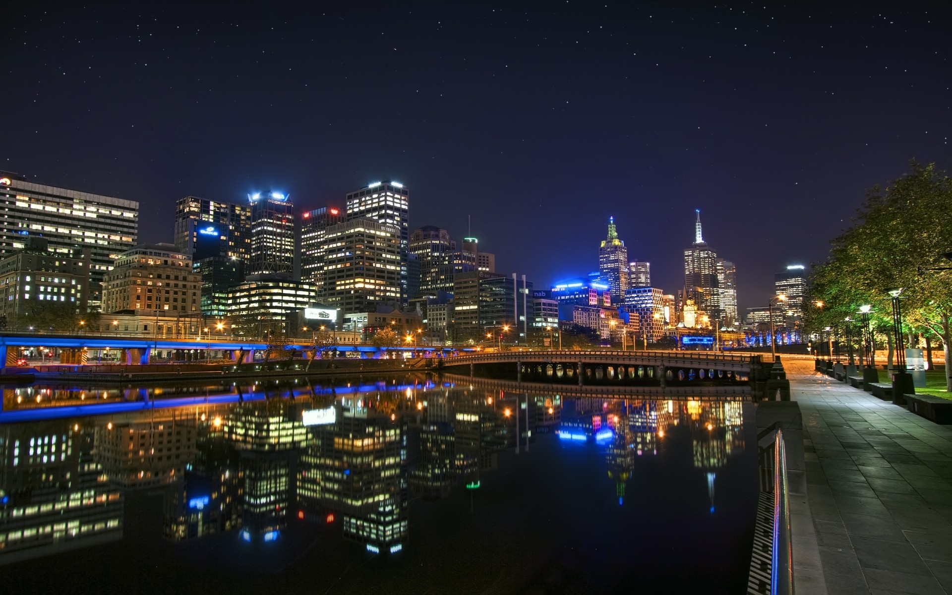 austrália cidade viagens crepúsculo arquitetura cidade noite casa ponte céu água iluminado skyline rio centro da cidade tráfego urbano arranha-céu moderno luz luz estrelas paisagem parque