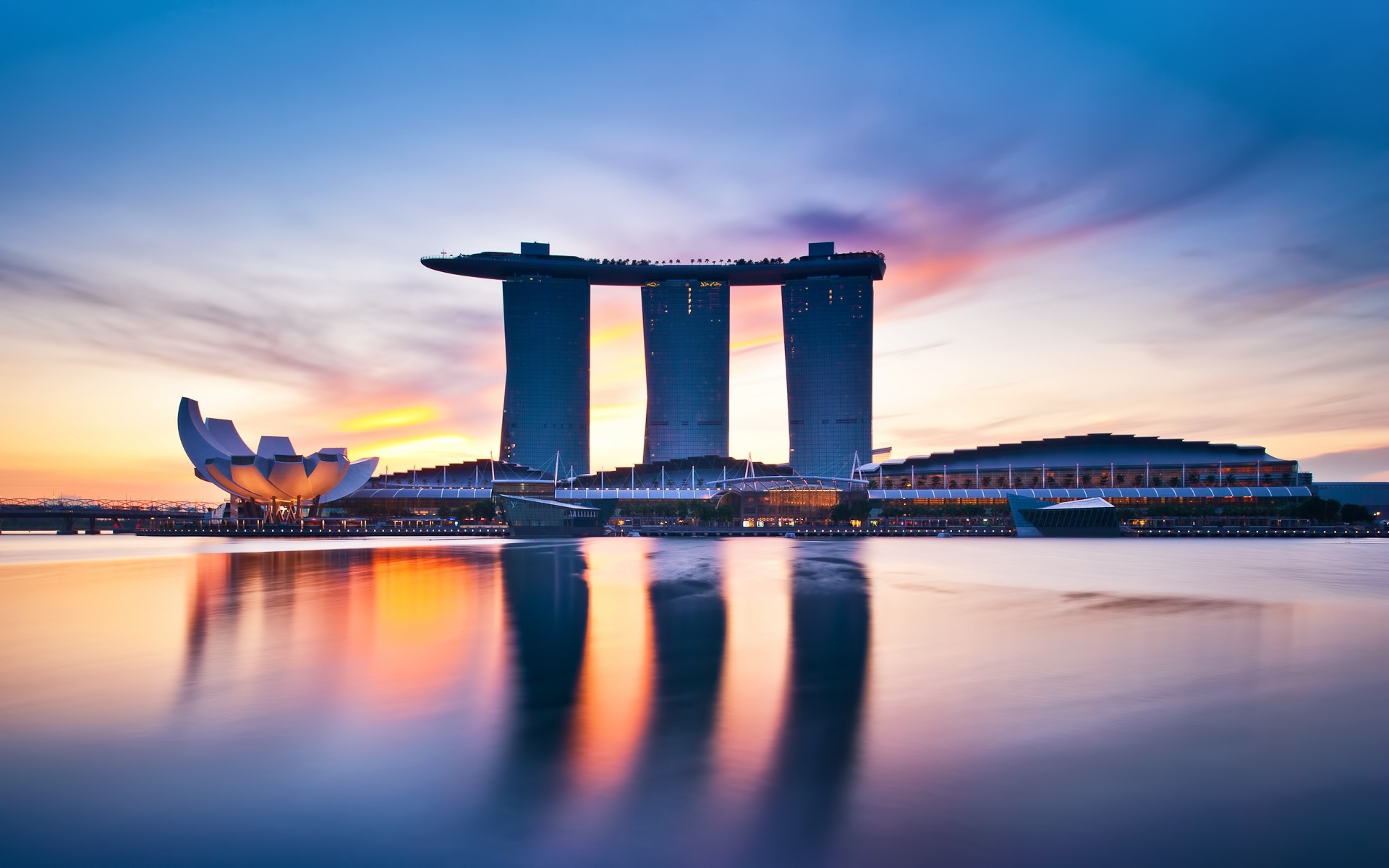 other city sunset water dusk architecture sky travel evening city reflection bridge dawn outdoors downtown river sea cityscape modern