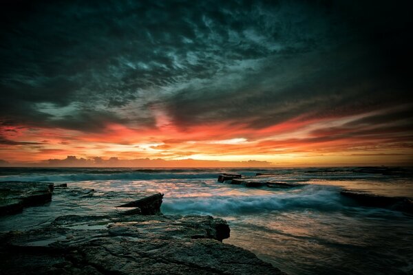 The sea was beating against sharp rocks