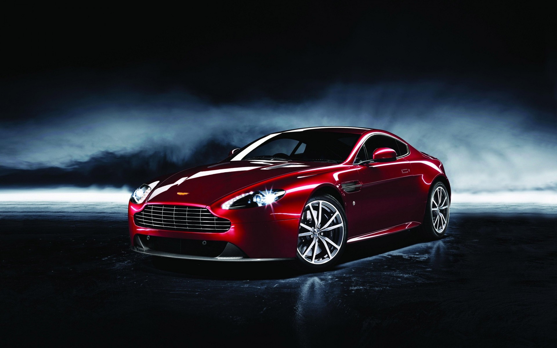 aston martin car vehicle hurry action transportation system pavement fast automotive blacktop asphalt wheel