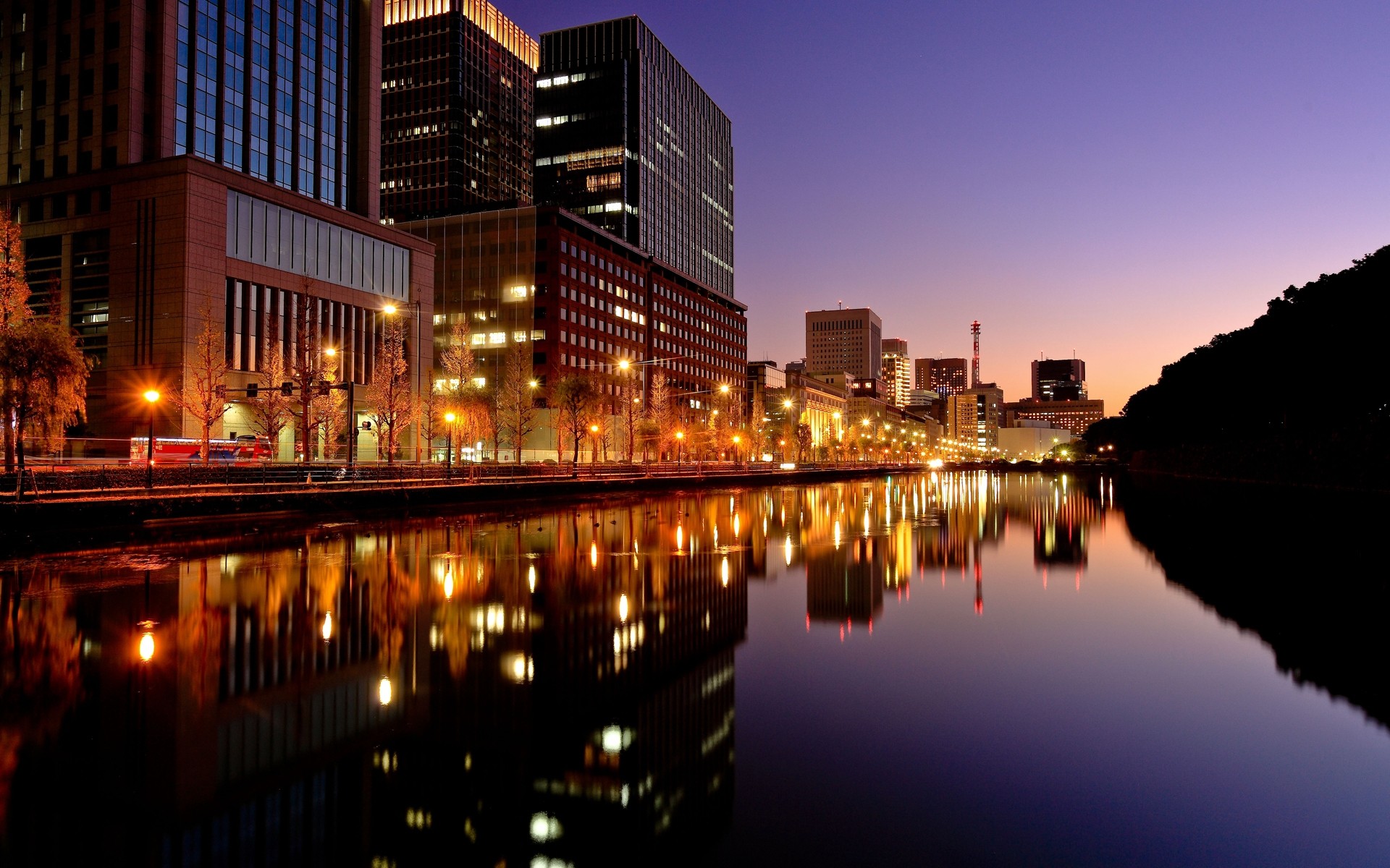 japão cidade arquitetura crepúsculo reflexão cidade centro da cidade casa água noite viagens skyline arranha-céu rio céu pôr do sol urbano ponte iluminado moderno noite luzes da noite