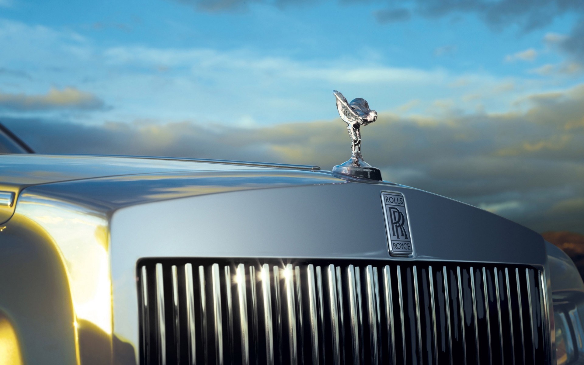 rolls royce sky travel vehicle light transportation system landscape outdoors daylight sunset sea car