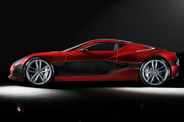 The concept of a red sports car on the side