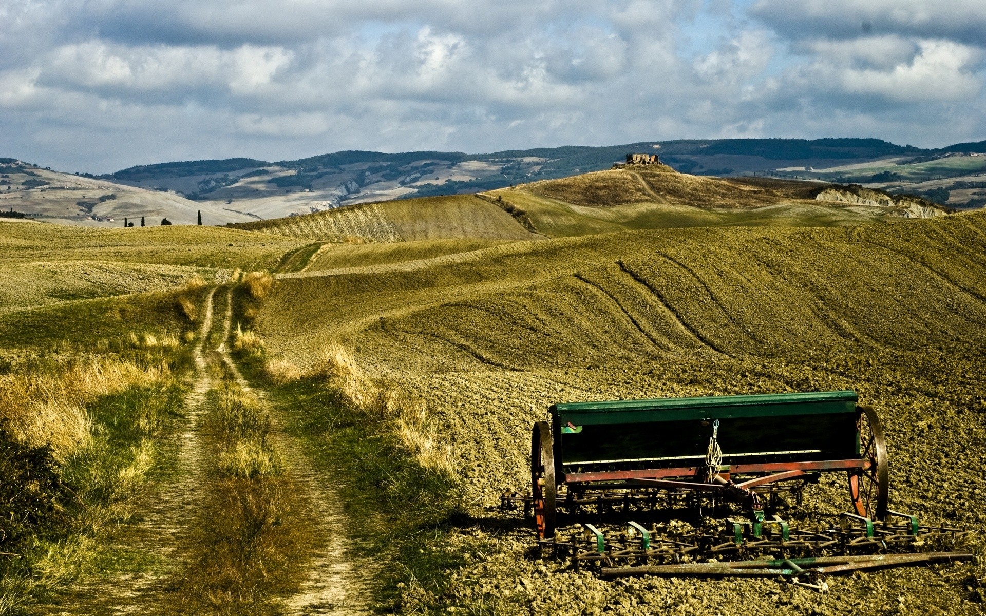 italy landscape agriculture farm field sky outdoors nature travel cropland countryside hill grass mountain rural scenic country road soil