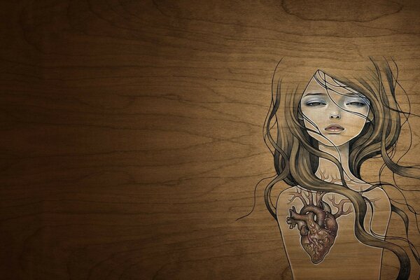 A girl with a heart on a wooden background